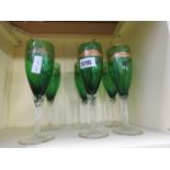 Six green wine glasses