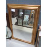 A rectangular bevelled mirror in gilt frame