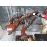 Three ornamental Flintlock pistols