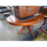 Oval reproduction yew coffee table