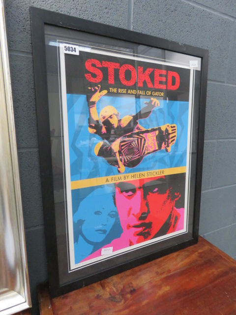 Framed and glazed poster entitled 'Stoked : A Film by Helen Stickler'