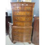 Dark wood chest on chest of 2 over 6 drawers