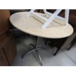 5184 - A circular marble topped bistro table