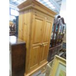 5149 - A pine double door wardrobe with drawer under