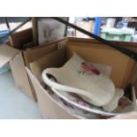 Three boxes containing a quantity of prints, a florally decorated washstand jug & bowl, children's