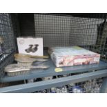 (11) Cage containing a glass chessboard, security lights and 3 dressing table brushes