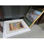 2 assorted framed and glazed travel posters