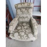 Green floral fabric armchair
