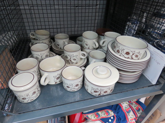 Cage containing a quantity of Hornsey floral patterned crockery