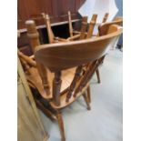 Four beech stick back dining chairs