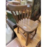 A child's elm seated chair
