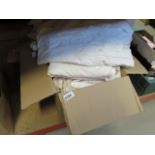 Box containing fabric and linen