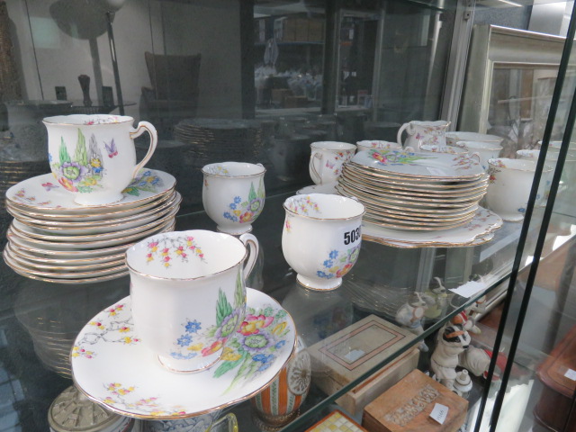 Shelf of standard china decorated with flowers