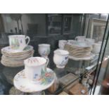 Shelf of standard china decorated with flowers