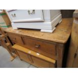 A pine dresser base with two drawers