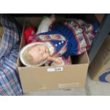 Box containing childrens dolls