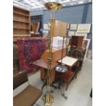 A brass finished mother & child floor lamp