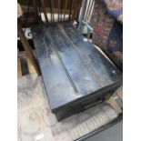 5129 - A black painted tin trunk