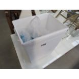 A canvas basket, plus bathroom dishes and pots