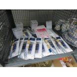 Cage containing erasable pen sets plus surgical gloves