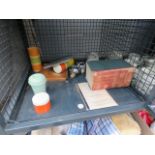 5675 - Cage containing cookery books and plastic kitchen storage vessels
