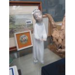 A Nao-style figure, girl with candle