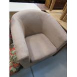 A brown suede effect tub chair