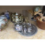 Cage with souvenir spoons, silver plated part cruet set plus brassware to include ornamental