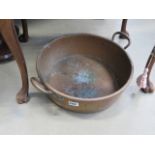 A copper preserve pan