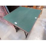 (8) A folding card table