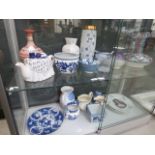 2 shelves of mainly blue and white china to include bowls and vases