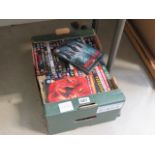 A box containing a quantity of DVD;s