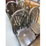 5142 - Six wheel back dining chairs