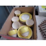 5770 - A box with yellow glazed crockery