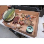 A box containing a singing fish, plus a quantity of ornamental tortoises and turtles