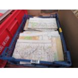 A box containing Ordnance Survey maps