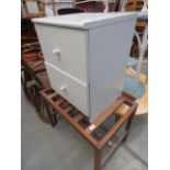 A cream painted two drawer bedside cabinet, plus a luggage stand