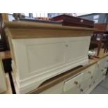 A cream painted blanket box