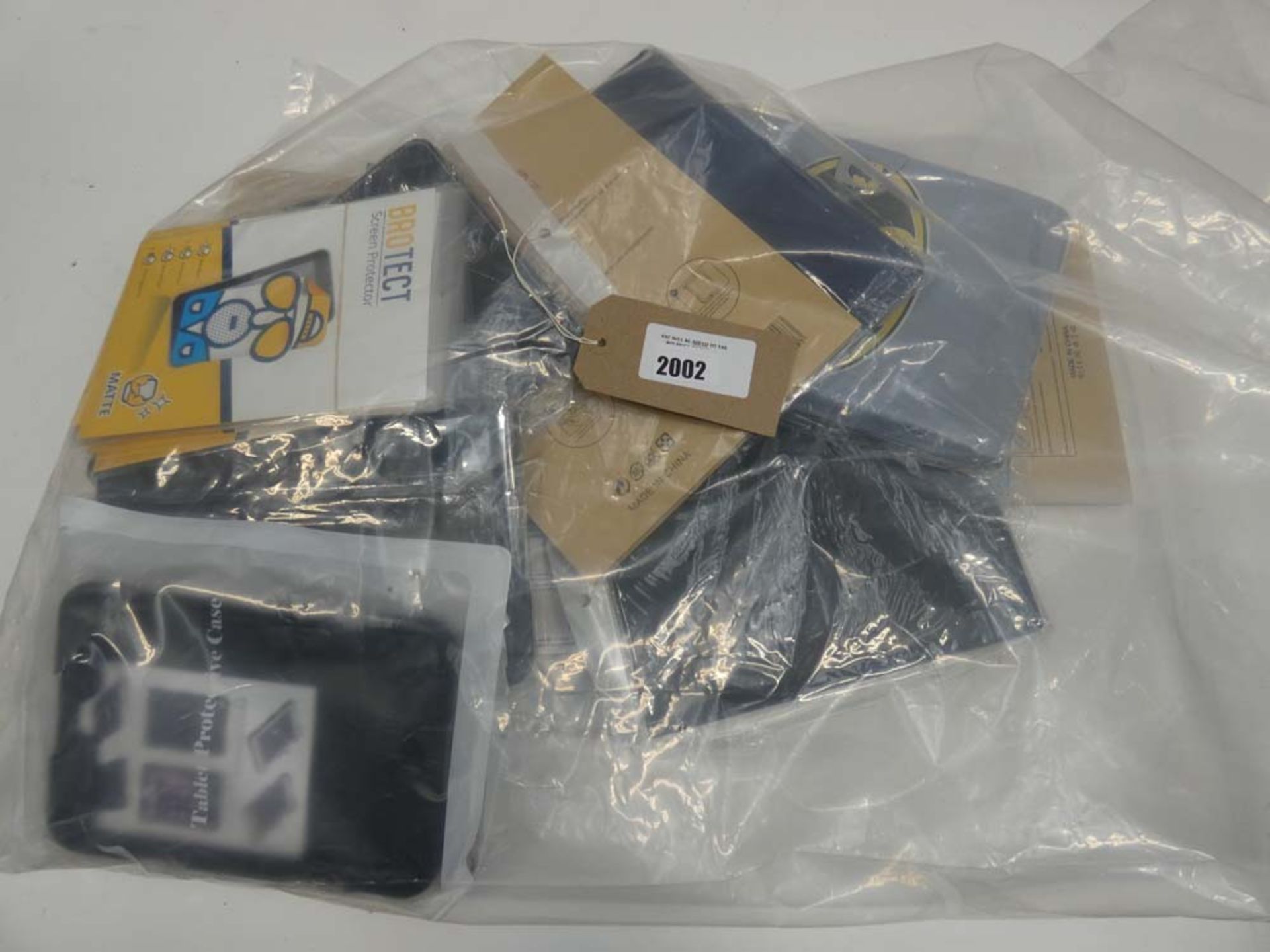 Bag containing quantity of various tablet cases