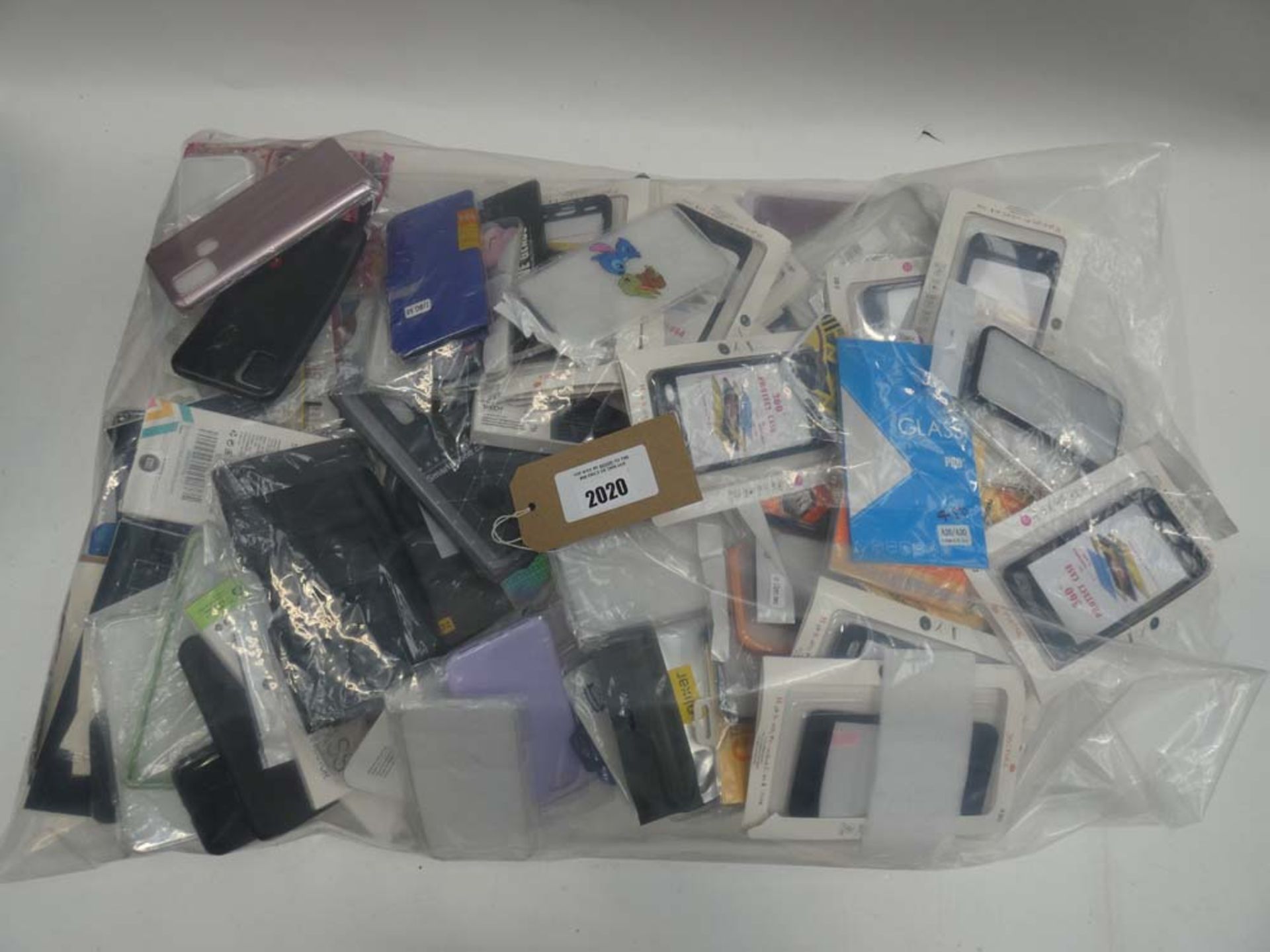 Bag containing quantity of mobile phone cases and covers