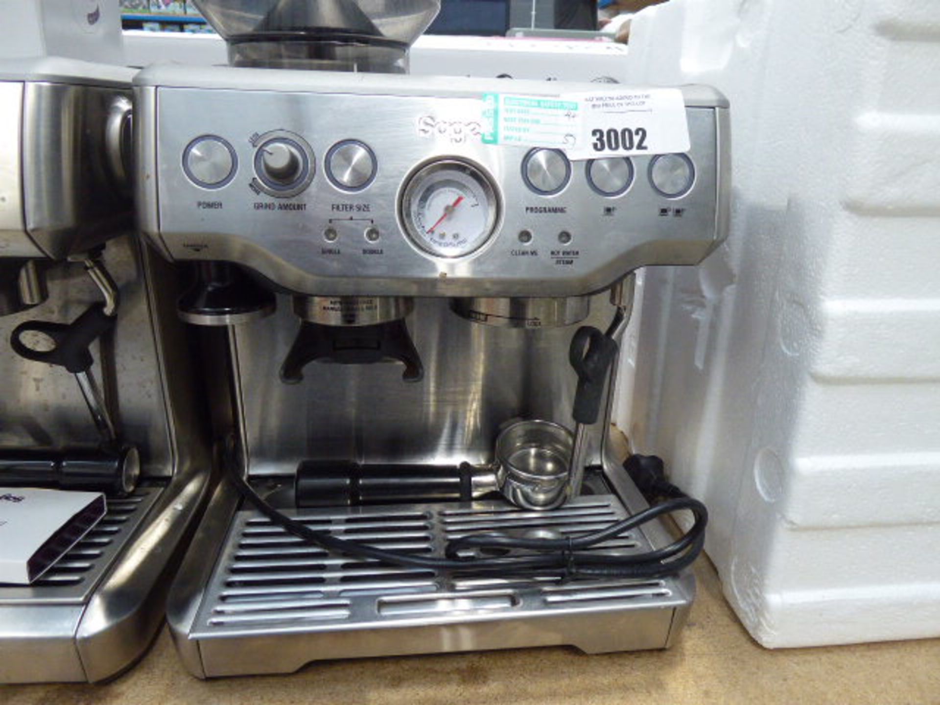 57 Unboxed Sage Barister Express coffee machine with some accessories