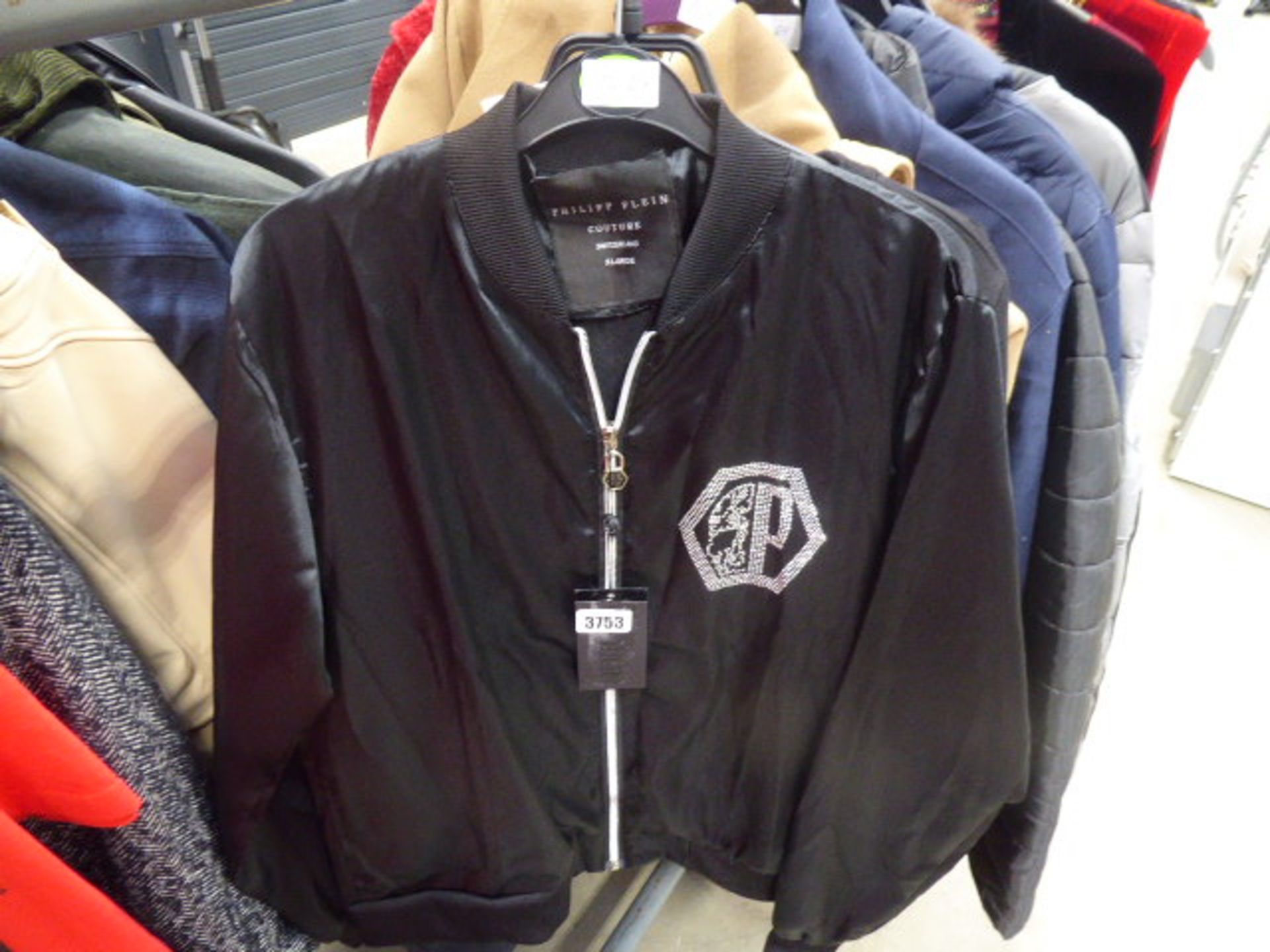 Philip Plain jacket size XL plus a Givenchy Paris jumper size S