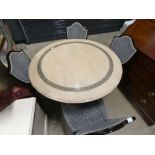 Circular faux marble table with Greek key pattern and 4 upholstered chairs