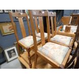 Four oak dining chairs with drop in seats