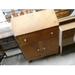 5458 Oak finished bureau with cupboard under