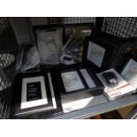 (15) Cage containing black stepped photo frames, pen pots and stationery