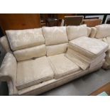 Cream floral three seater sofa plus matching arm chairs footstool and scatter cushions