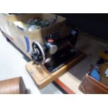 Cased singer sewing machine