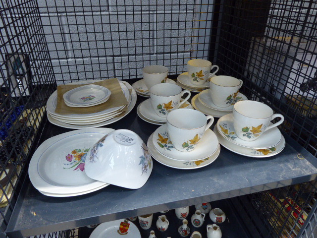 (6) Cage containing a quantity of leaf patterned saucers and other crockery