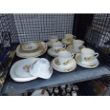 (6) Cage containing a quantity of leaf patterned saucers and other crockery